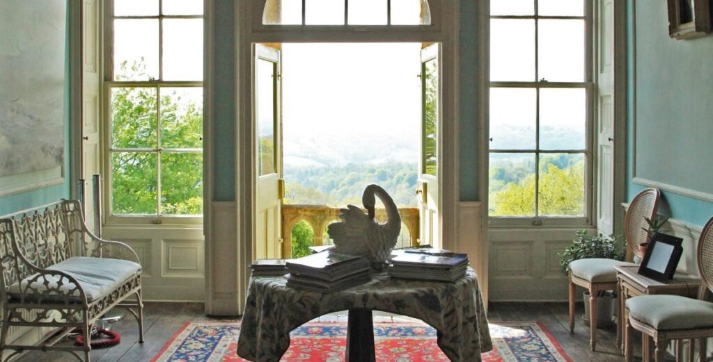 Interior room at Newark Park looking out on to Cotswold countryside views.