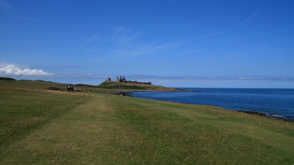 Dunstanburgh Castle next to the North Sea