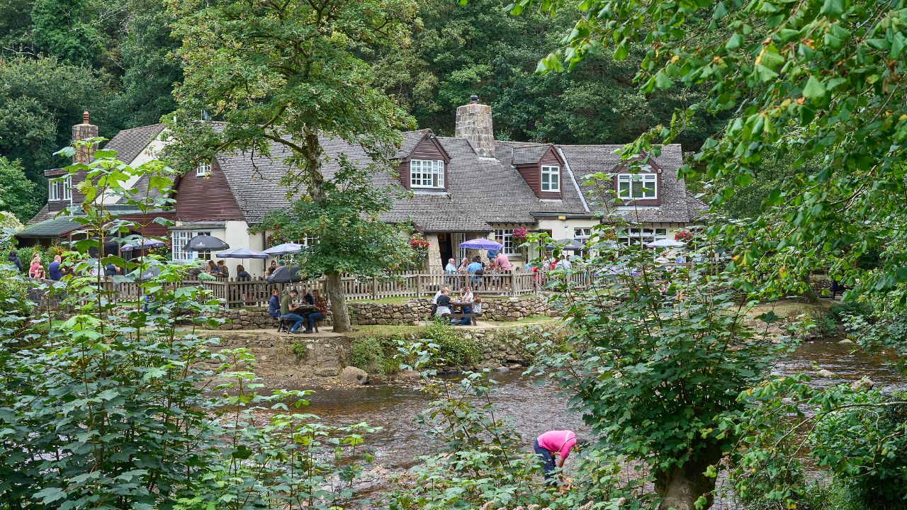 Pub beside a river on the Castle Drogo Walk