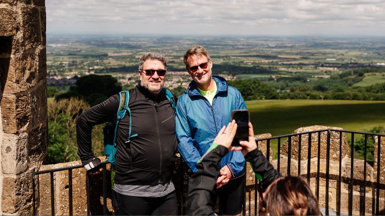 Two men having a picture taken