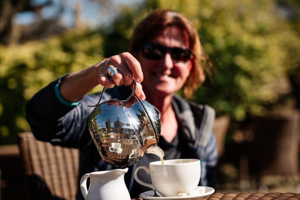 Pouring tea in the garden